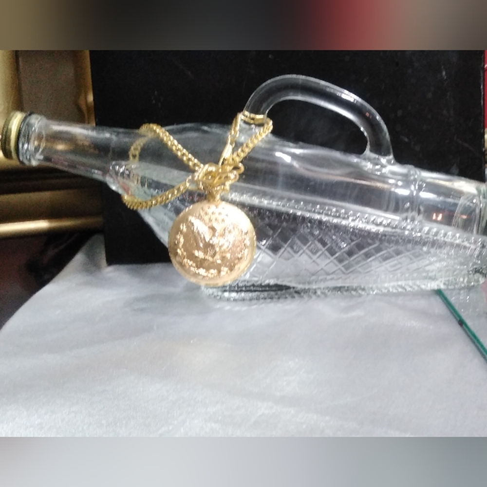 Vintage 1960's glass Bottle in a basket with gold pocket watch